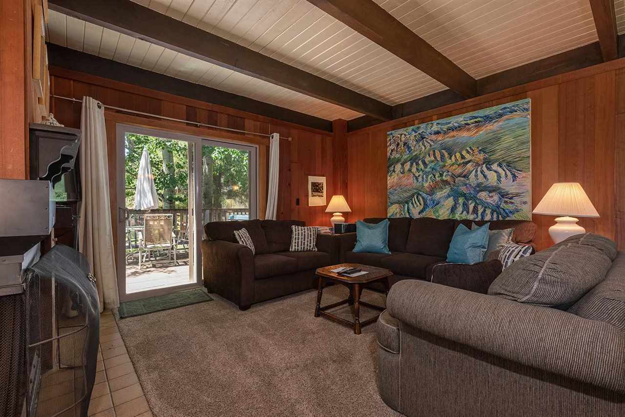 Living room with gas fireplace at the Lake Tahoe ski cabin